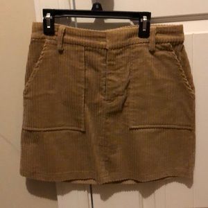 Tan above the knee skirt
